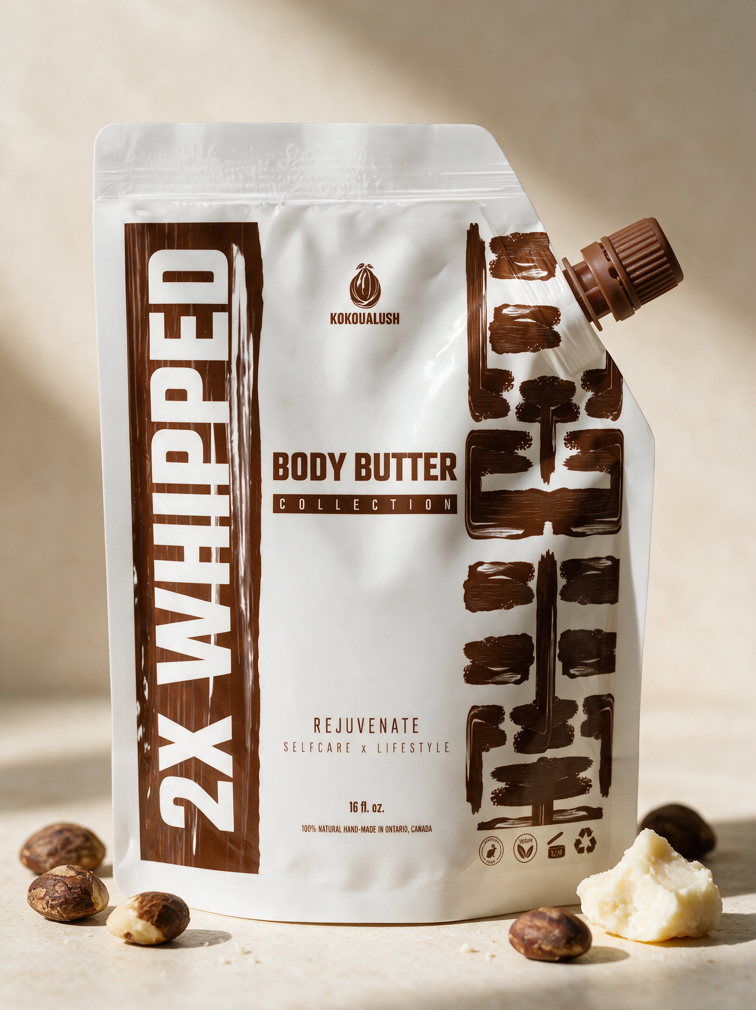 Kokoualush 2X Whipped Body Butter pouch with raw shea nuts and shea butter
