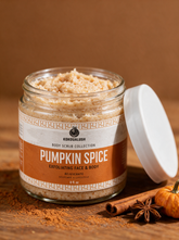 Kokoualush Pumpkin Spice Body Scrub in an 8oz glass jar with cinnamon sticks and star anise