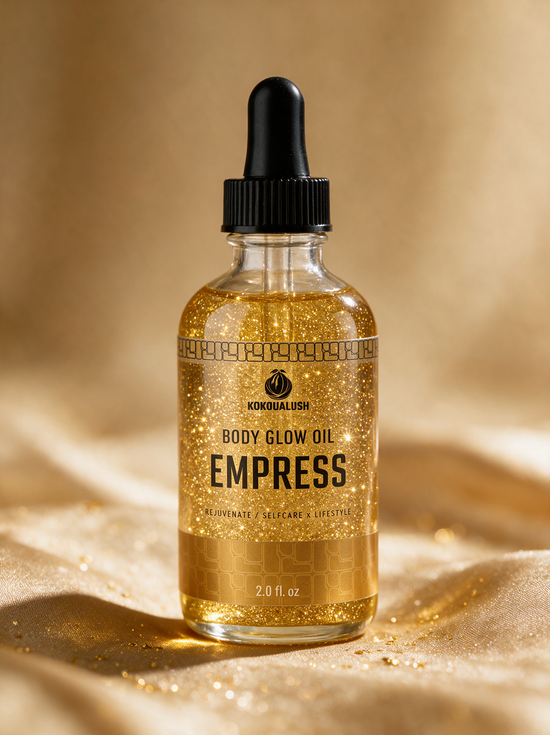 Kokoualush Empress gold shimmer Body Glow Oil dropper bottle on gold silk