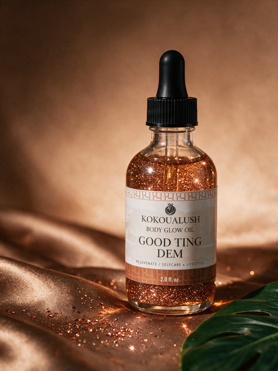 Kokoualush Good Ting Dem bronze shimmer Body Glow Oil dropper bottle on bronze silk