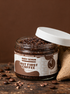Kokoualush But First Coffee Body Scrub in an 8oz glass jar with roasted coffee beans and burlap
