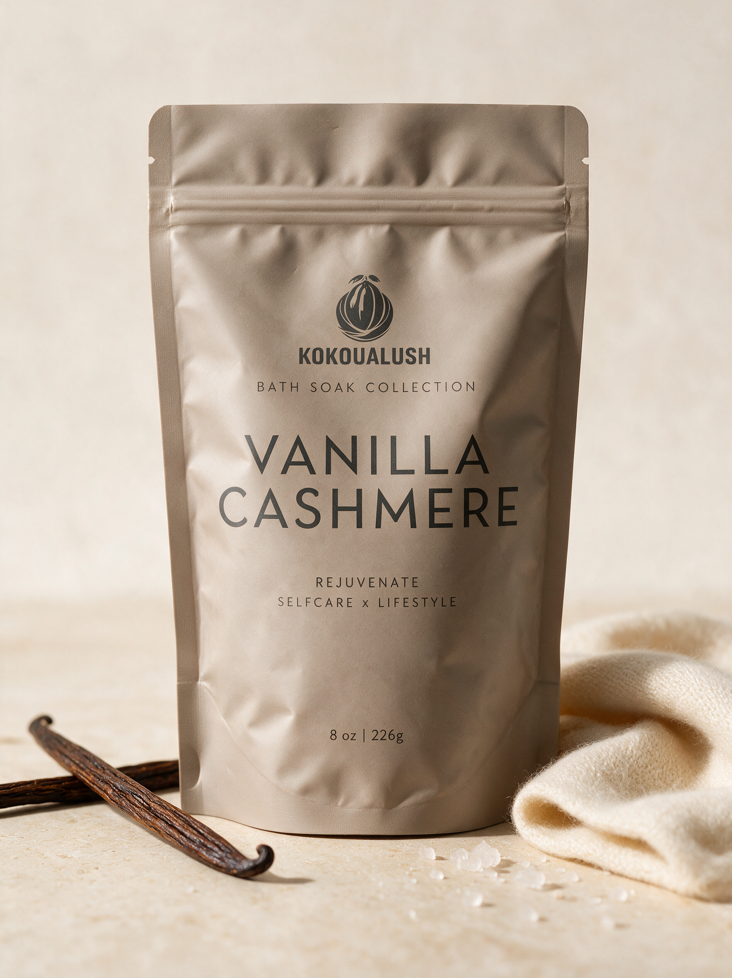 Kokoualush Vanilla Cashmere Bath Soak pouch with vanilla pods and cashmere cloth