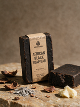 Kokoualush African Black Soap Bar with kraft belly band, cocoa shells and plantain ash