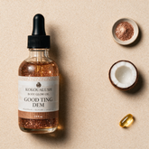 Kokoualush Good Ting Dem Body Glow Oil with bronze shimmer mica, coconut and vitamin E