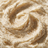 Macro texture of ivory vanilla sugar scrub with vanilla bean specks
