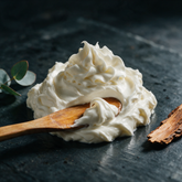 Kokoualush Men Moisture whipped body butter soft swirl on dark slate with eucalyptus and cedar