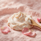 Kokoualush Rose Whipped body butter soft swirl on blush linen with rose petals
