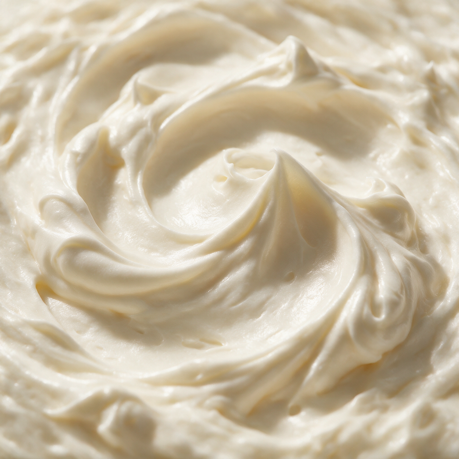 Macro texture of pure whipped shea body butter peaks