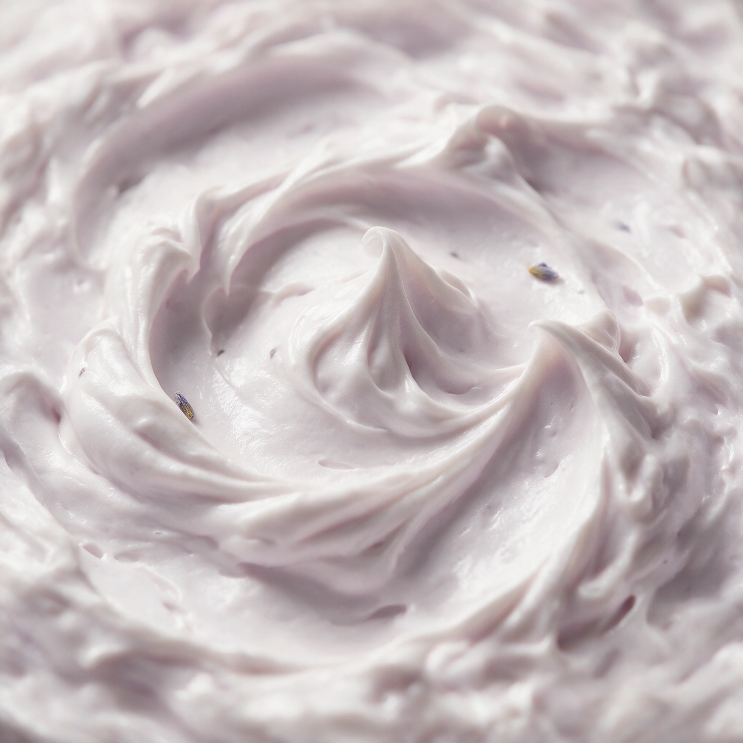 Macro texture of whipped lavender body butter peaks