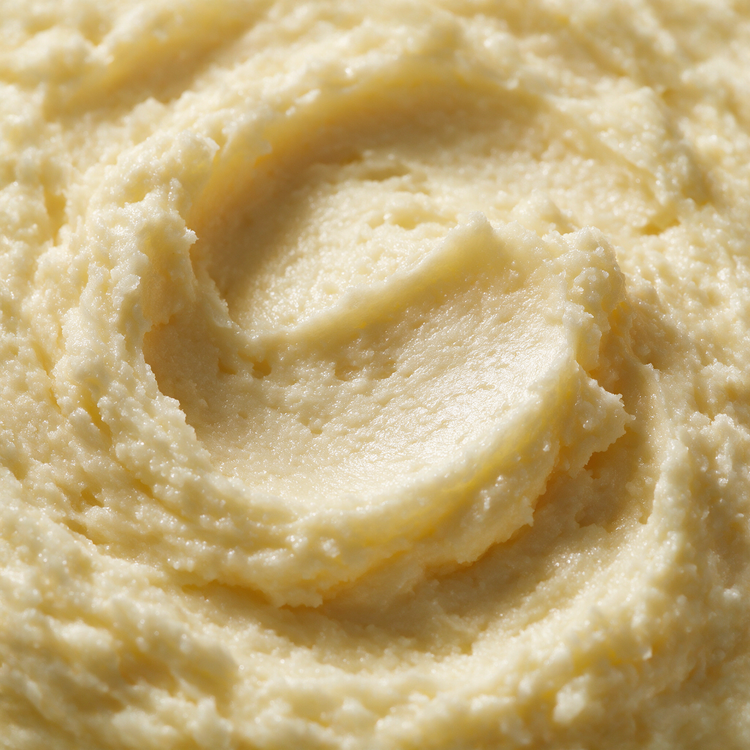 Macro of raw unrefined ivory shea butter texture