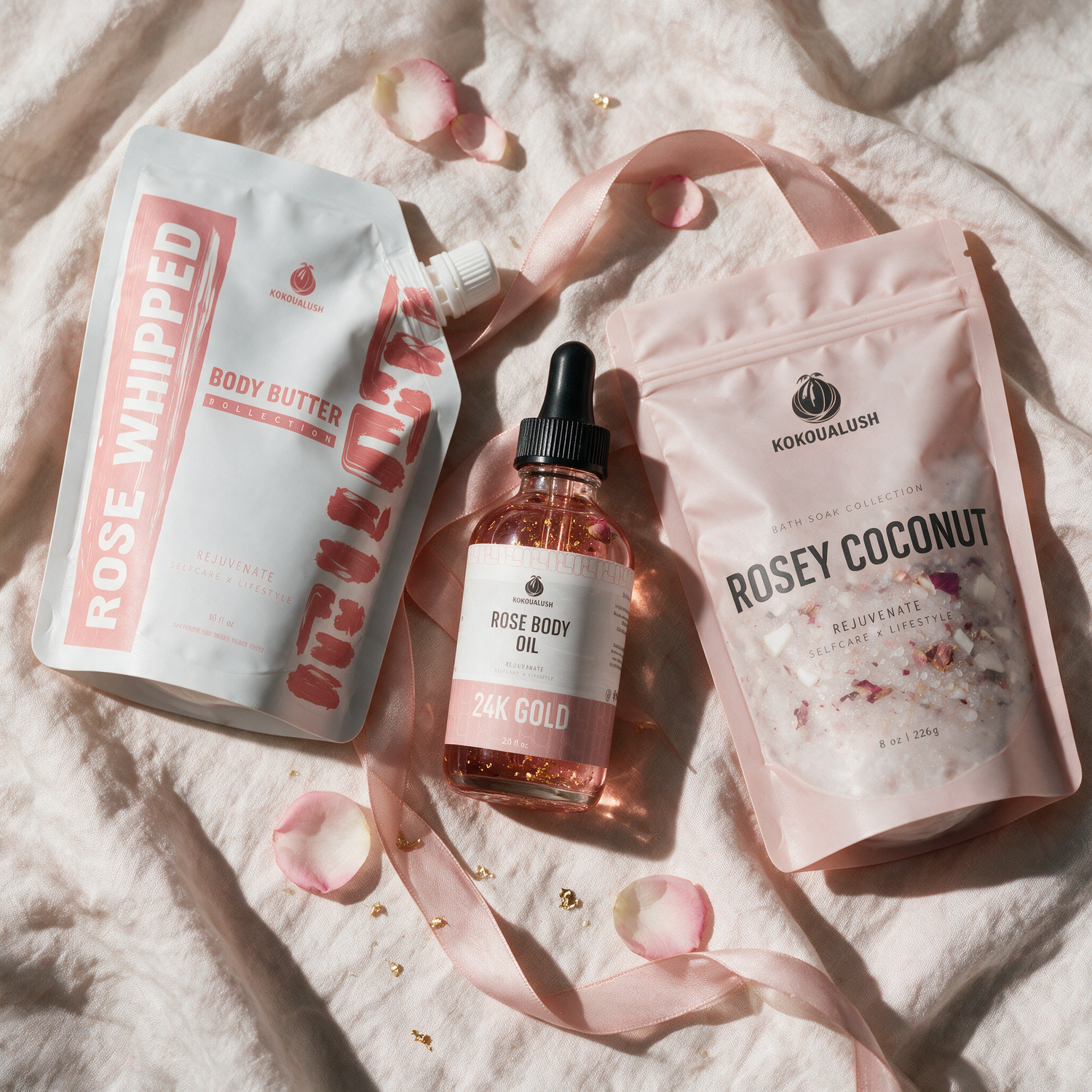 Kokoualush Rose Trio gift set styled with rose petals and ribbon