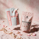 Kokoualush Rose Bundle gift set styled with rose petals and ribbon
