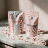 Rose Bundle ritual on a sunlit marble vanity with rose petals