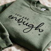 Macro of the sage crewneck fleece and You Are Enough print detail