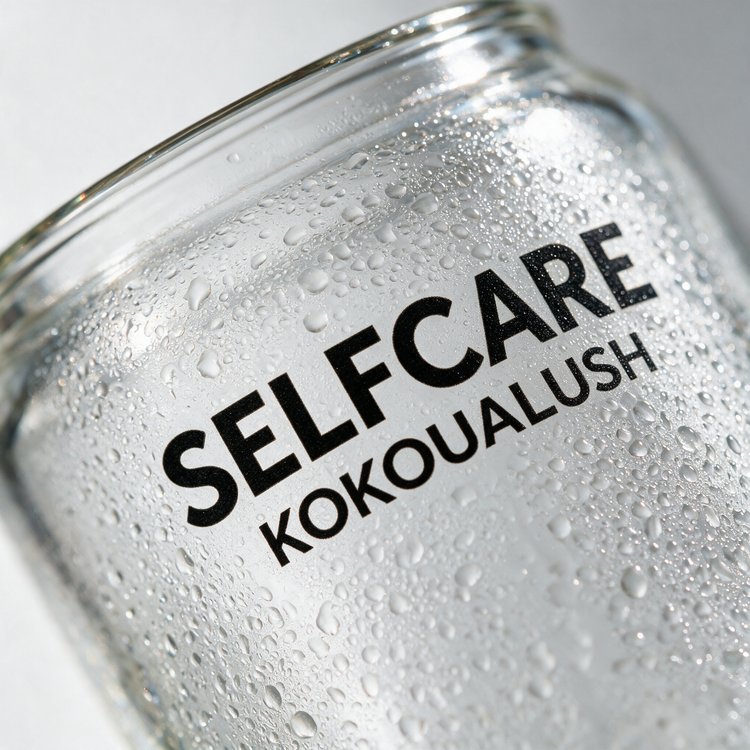 Macro of the Selfcare glass affirmation print with condensation
